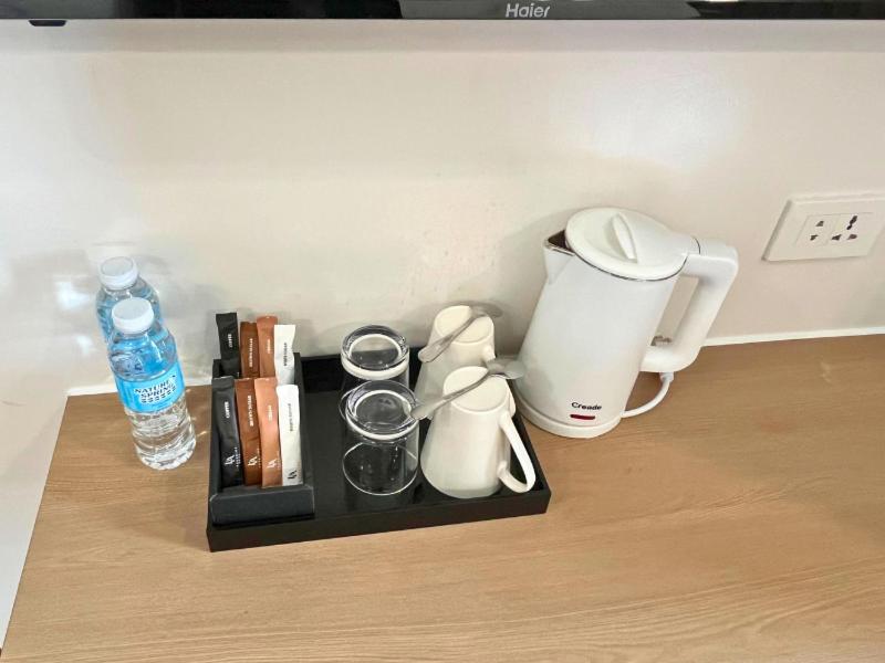 Příslušenství pro přípravu čaje a kávy v ubytování L' Asuncion Hotel
