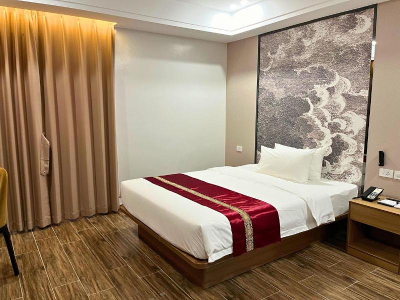 Postel nebo postele na pokoji v ubytování L' Asuncion Hotel
