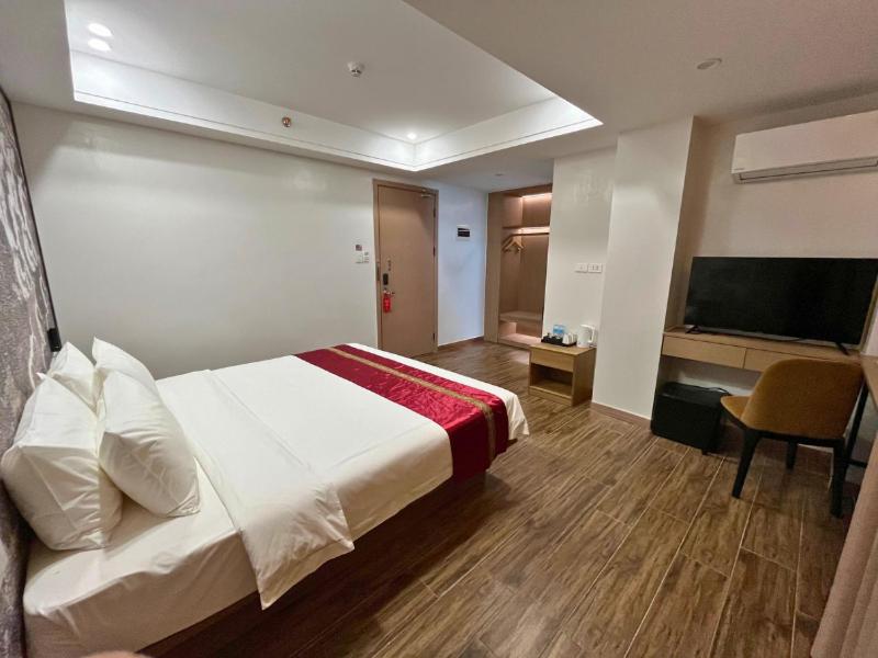 TV a/nebo společenská místnost v ubytování L' Asuncion Hotel