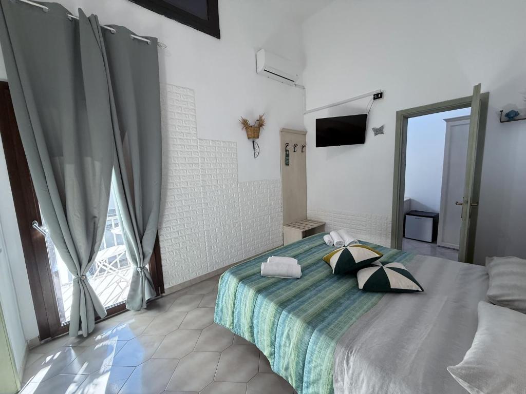 Bed and Breakfast Station 객실 침대