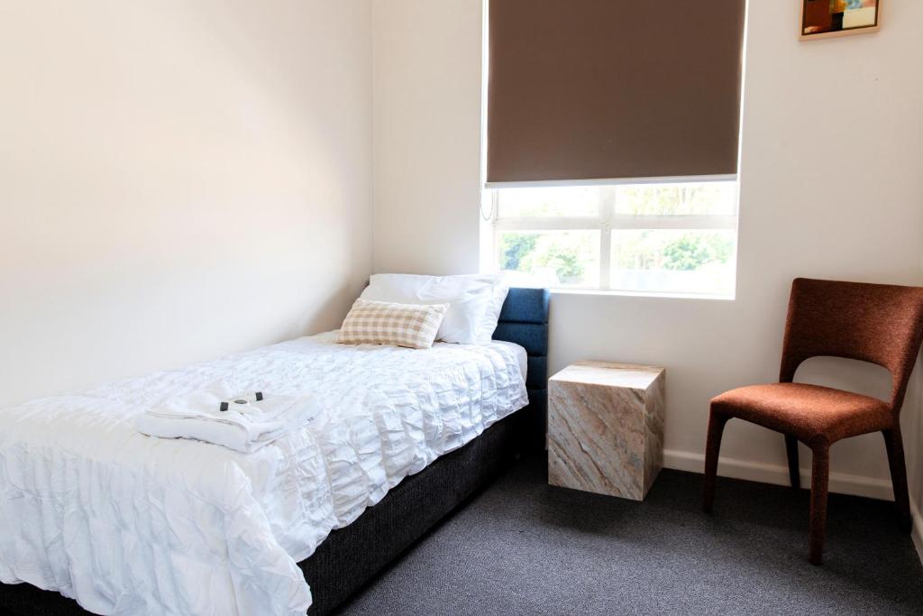 Postel nebo postele na pokoji v ubytování Figtree Hotel Wollongong