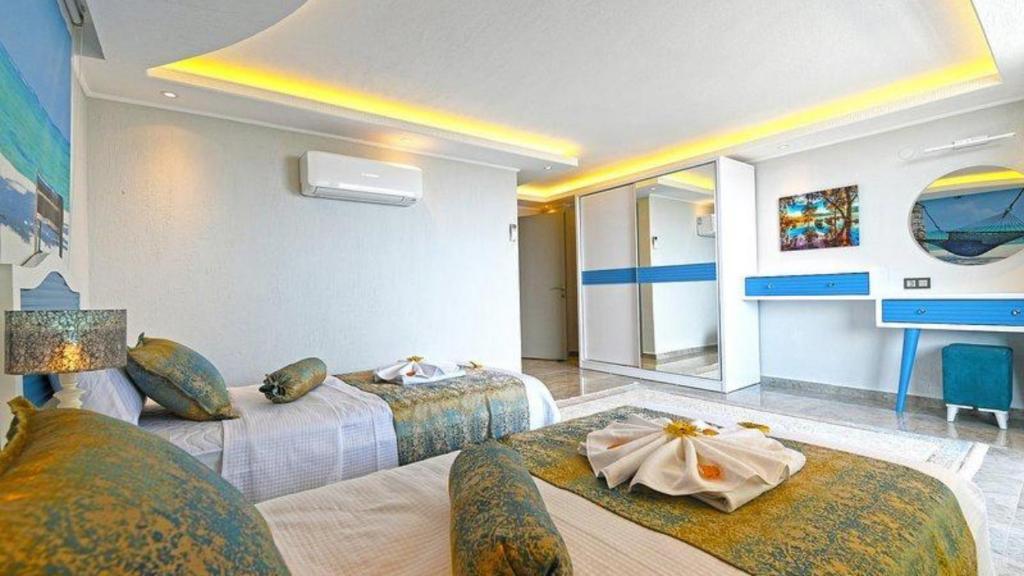 Postel nebo postele na pokoji v ubytování Kalkan 3 Bedroom Villa 1656