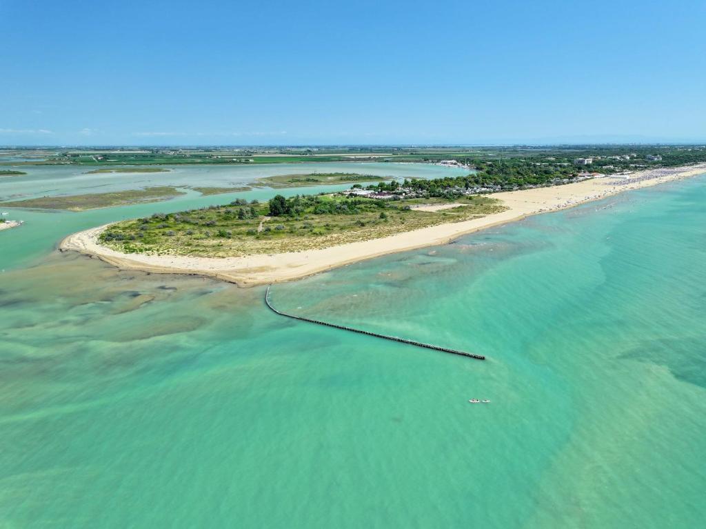 an island in the middle of the ocean at Camping Village Capalonga in Bibione