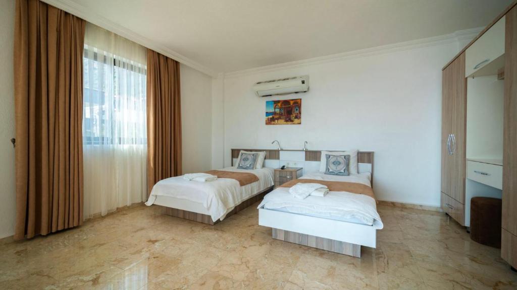 Postel nebo postele na pokoji v ubytování Kalkan 5 Bedroom Villa 1684