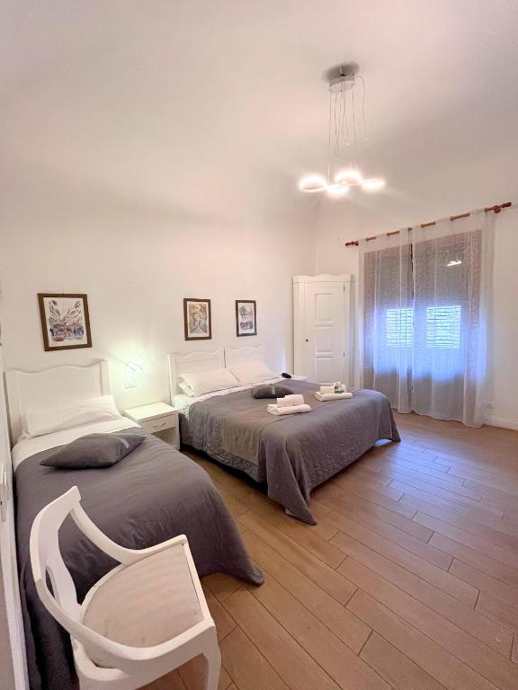 Postel nebo postele na pokoji v ubytování Giulio Cesare 14, Residence