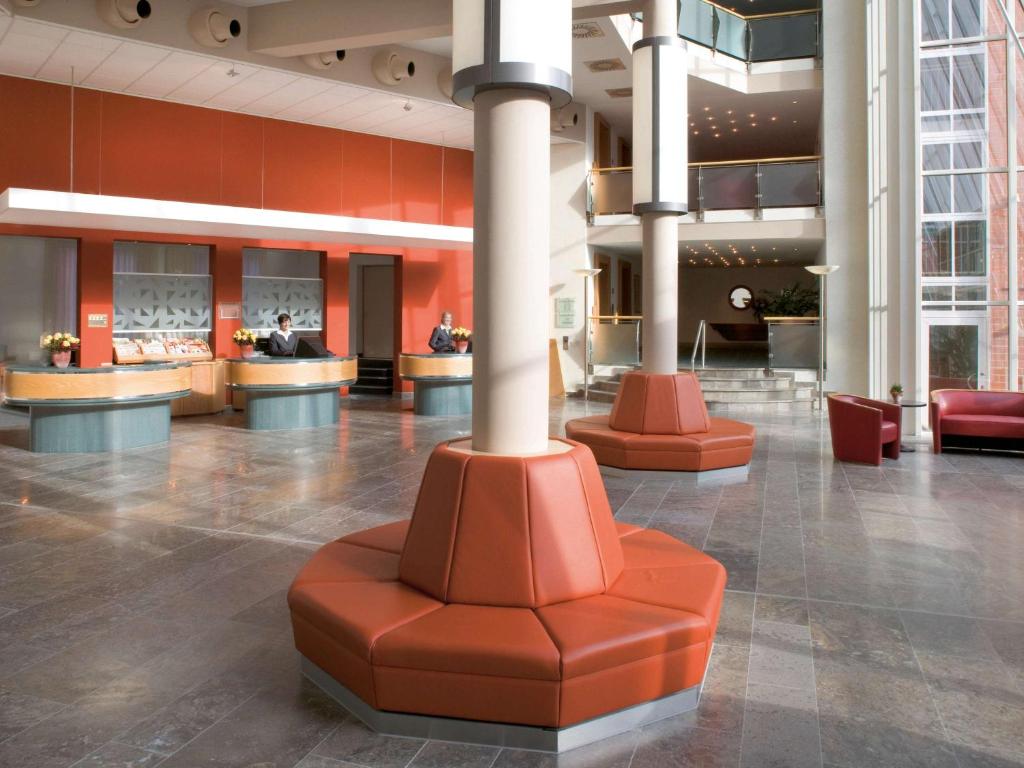 Posezení v ubytování Mövenpick Hotel Münster am Aasee