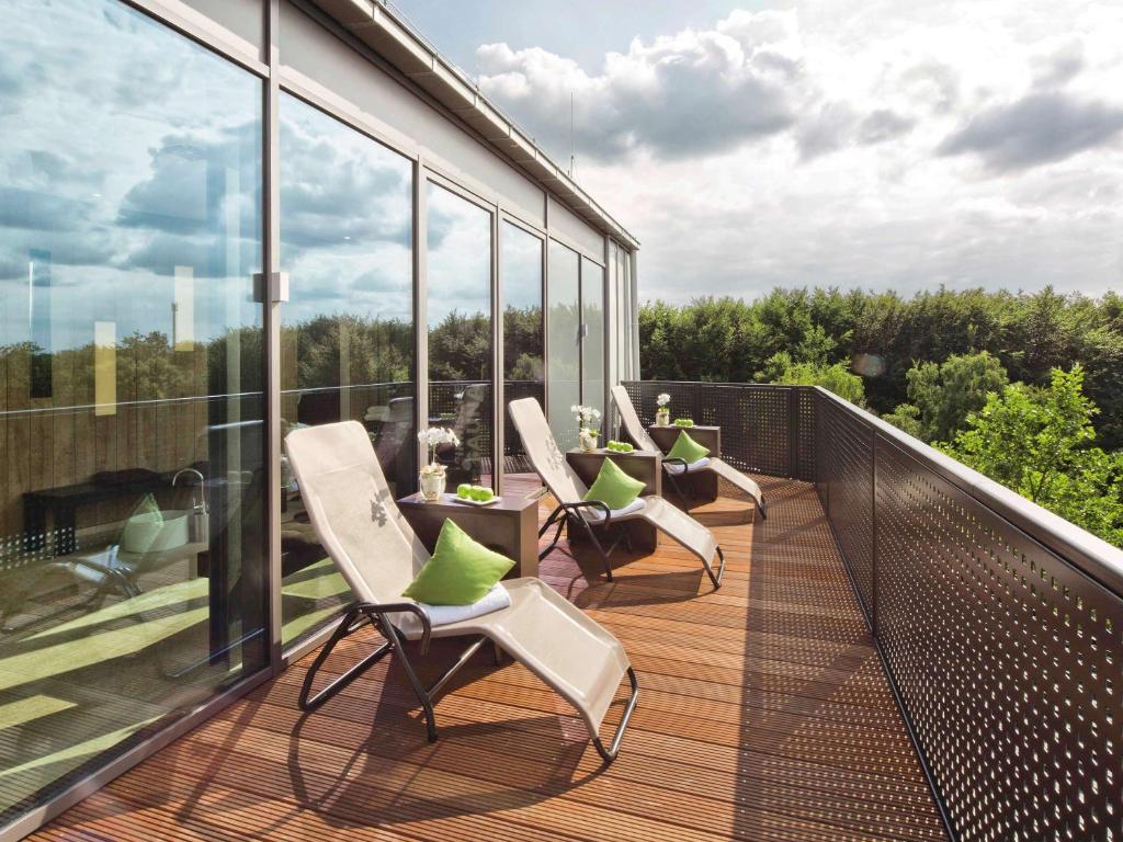 Balkón nebo terasa v ubytování Mövenpick Hotel Münster am Aasee