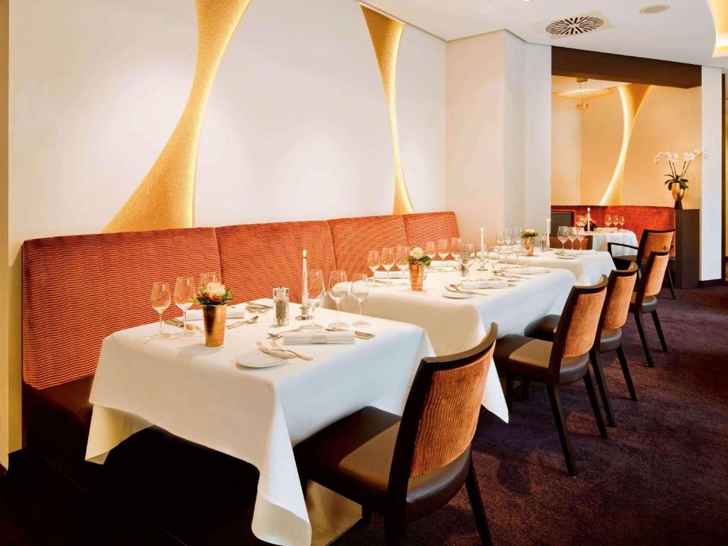 Restaurace v ubytování Mövenpick Hotel Münster am Aasee