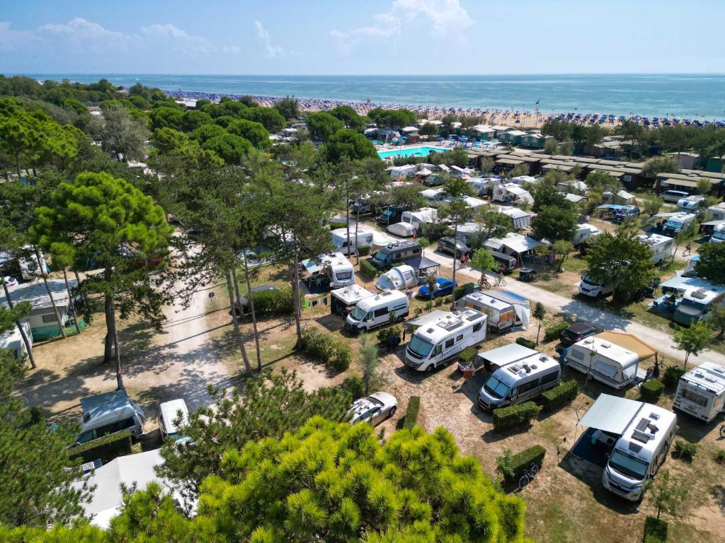 an aerial view of a parking lot with parked vehicles at Camping Lido in Bibione