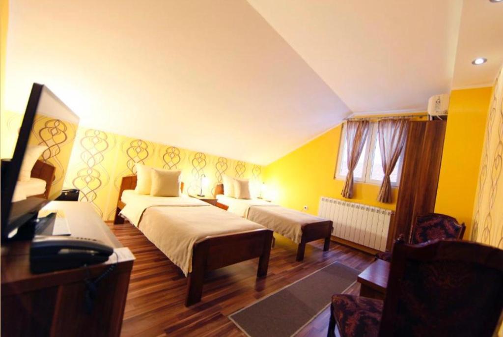 Postel nebo postele na pokoji v ubytování Rooms SQUARE Belgrade