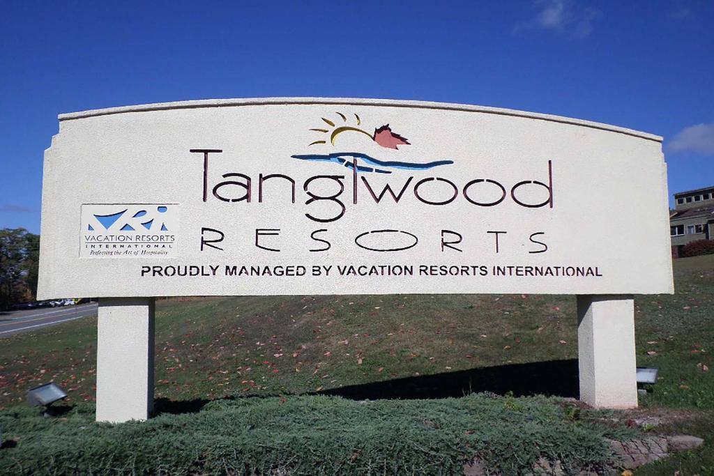 a sign for the tangwood resorts resort at Tanglwood Resort, a VRI resort in Hawley