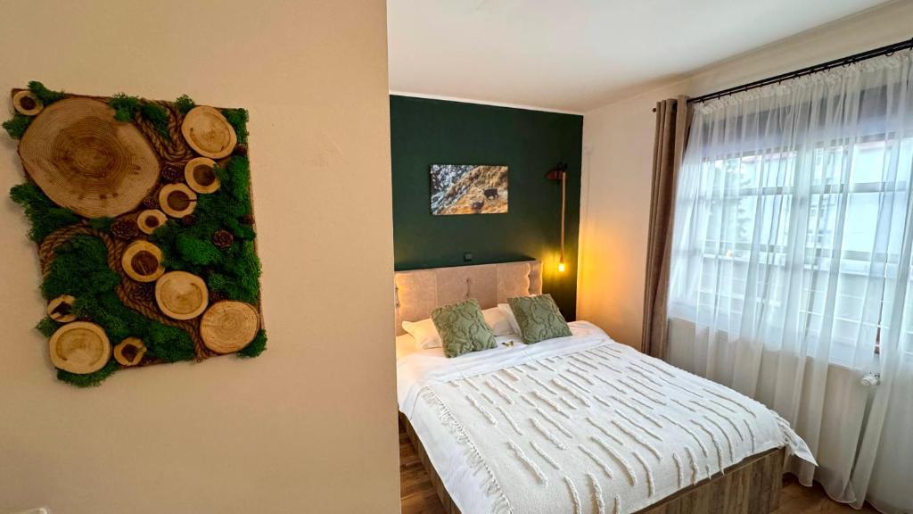 Postel nebo postele na pokoji v ubytování Casa Traian