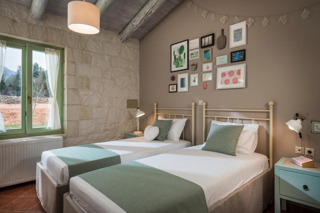 Postel nebo postele na pokoji v ubytování BOUTIQUE VILLA PETRA AMANDA Heated pool optional