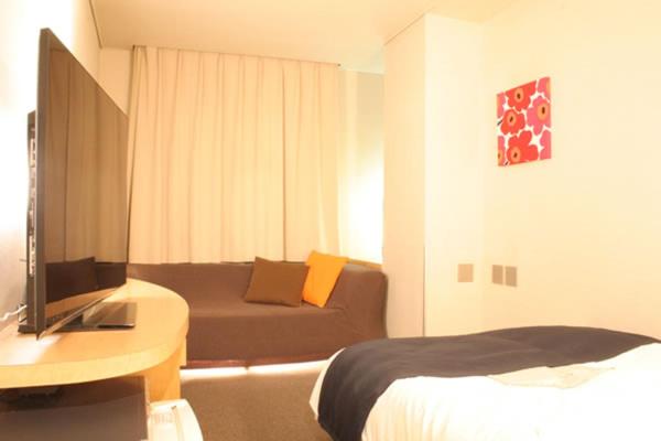 TV a/nebo společenská místnost v ubytování Hotel Estacion Hikone