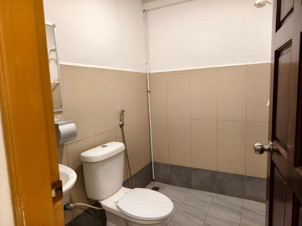 Koupelna v ubytování Shoreline Guesthouse 海岸线客栈