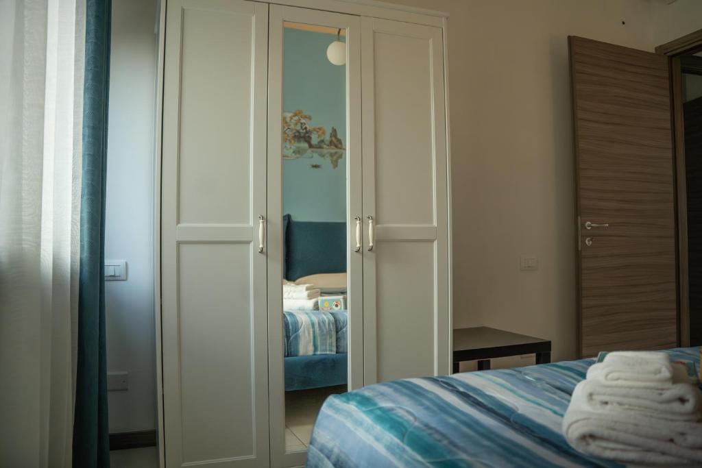Postel nebo postele na pokoji v ubytování Lugaro Guest House