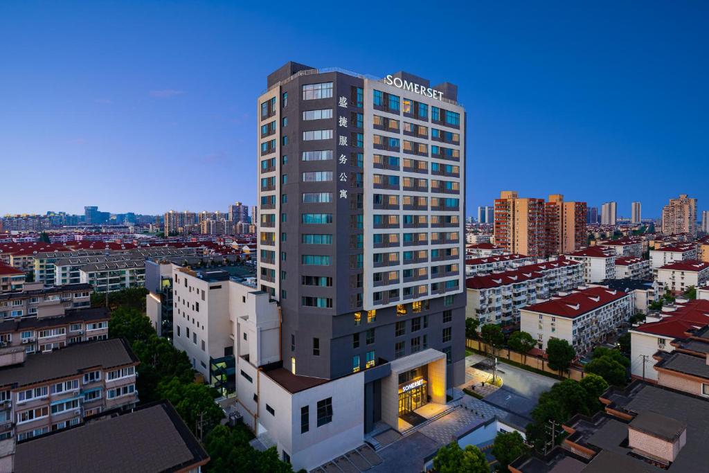 an overhead view of a tall building in a city at Somerset Xuhui Riverside Shanghai serviced apartments in Shanghai
