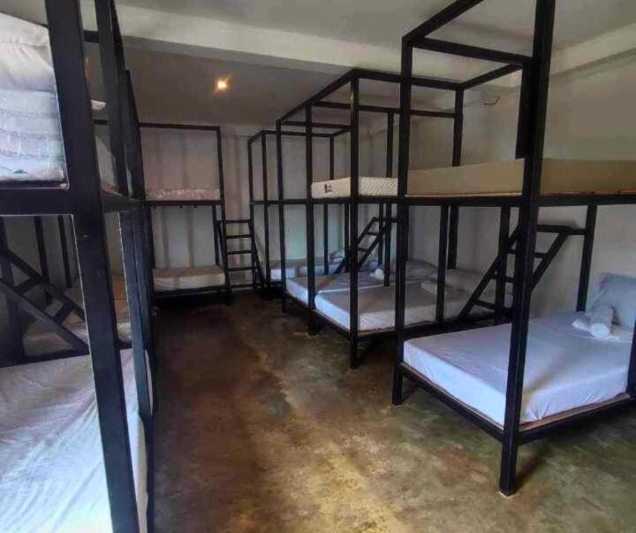 Postel nebo postele na pokoji v ubytování Tuyom by Hostel 7