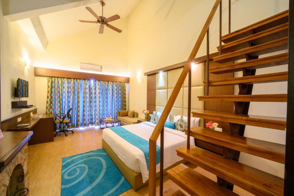 Postel nebo postele na pokoji v ubytování Sinclairs Retreat Kalimpong
