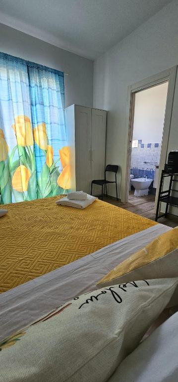 Postel nebo postele na pokoji v ubytování B&b A Due Passi Dal Sole