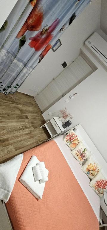 Postel nebo postele na pokoji v ubytování B&b A Due Passi Dal Sole