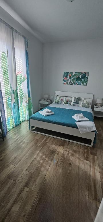 Postel nebo postele na pokoji v ubytování B&b A Due Passi Dal Sole