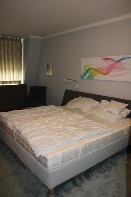 Postel nebo postele na pokoji v ubytování Hotel Lachnerhof