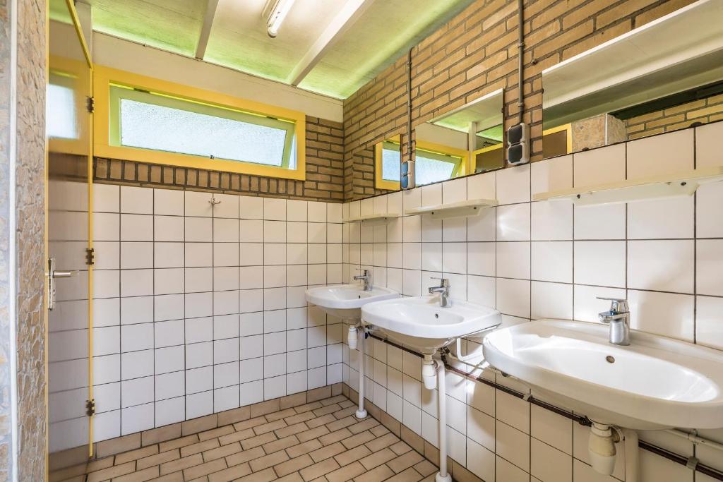 Koupelna v ubytování Camping het Bosbad