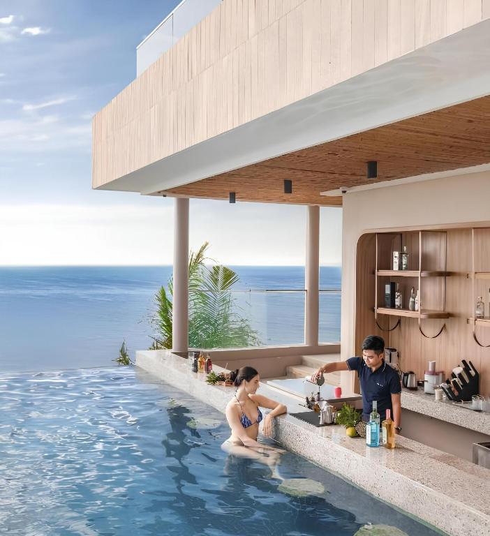 a rendering of a villa with a kitchen in the swimming pool at Mandala Pearl Azure Retreat in Ấp Nhơn Long