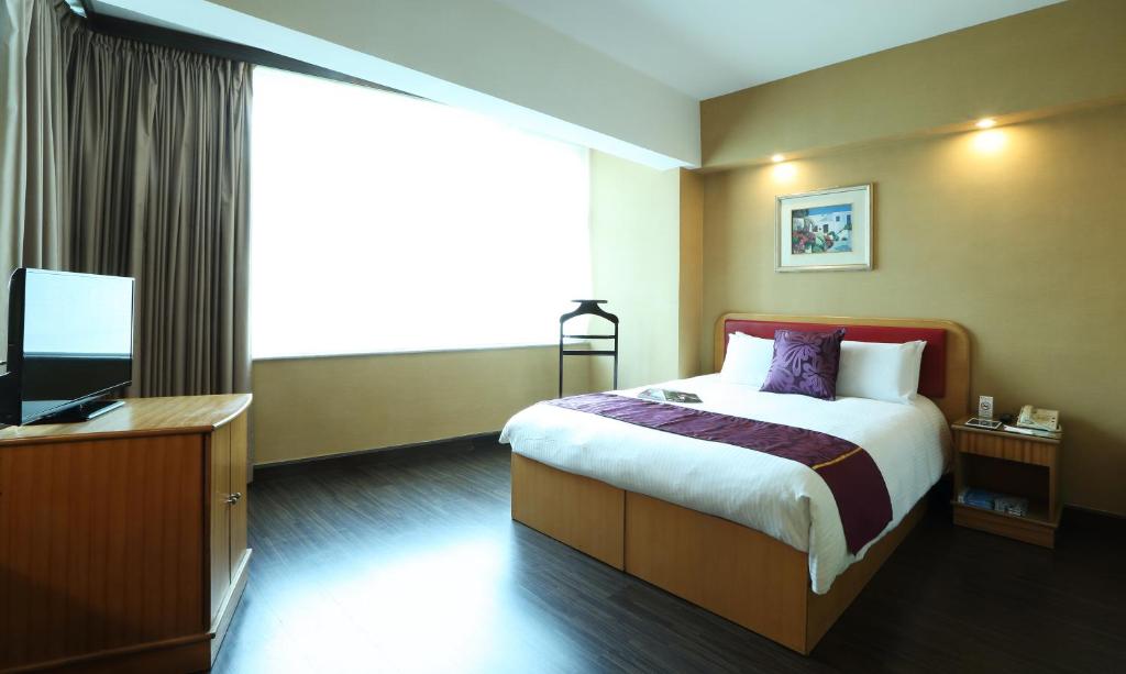 Voodi või voodid majutusasutuse The Imperial Hotel toas