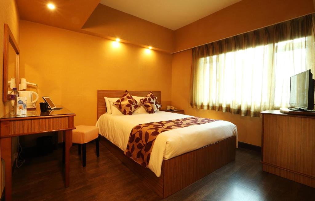 Voodi või voodid majutusasutuse The Imperial Hotel toas