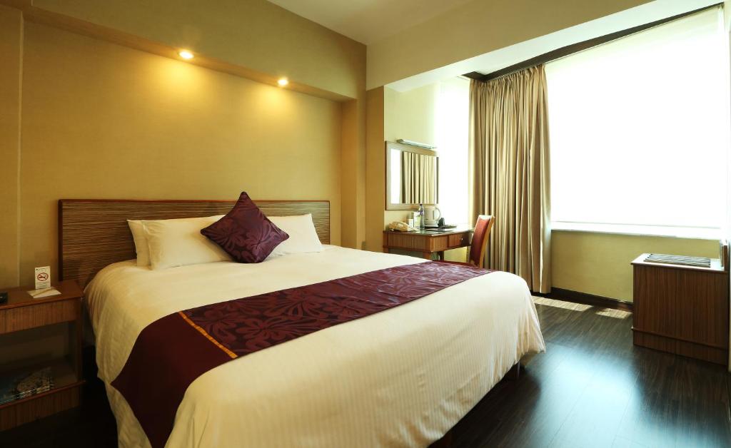Voodi või voodid majutusasutuse The Imperial Hotel toas