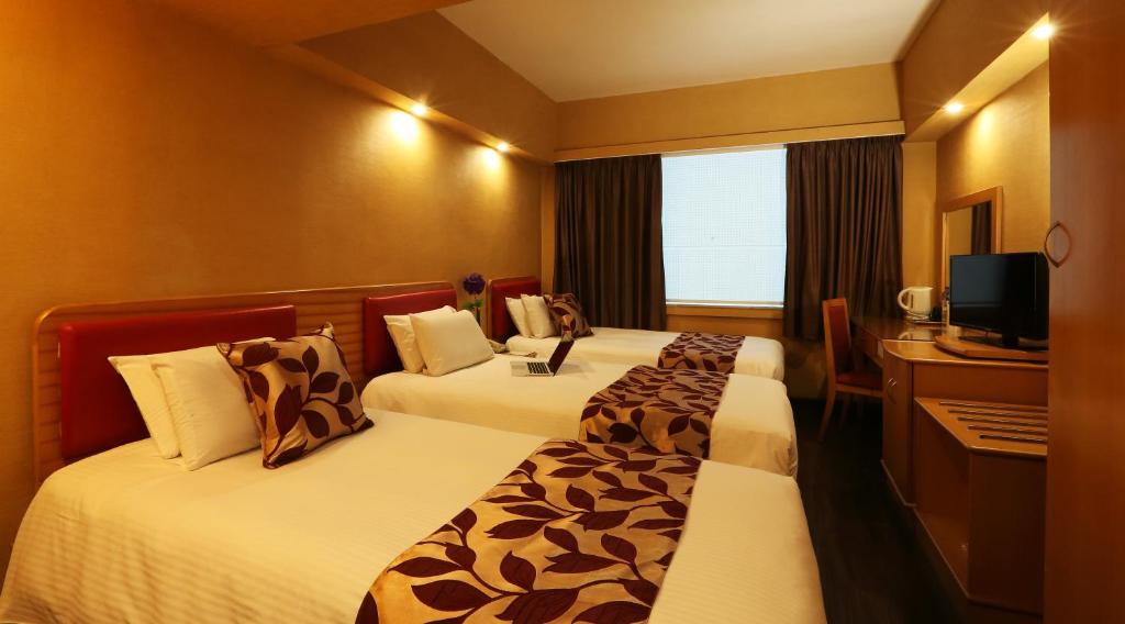 Voodi või voodid majutusasutuse The Imperial Hotel toas