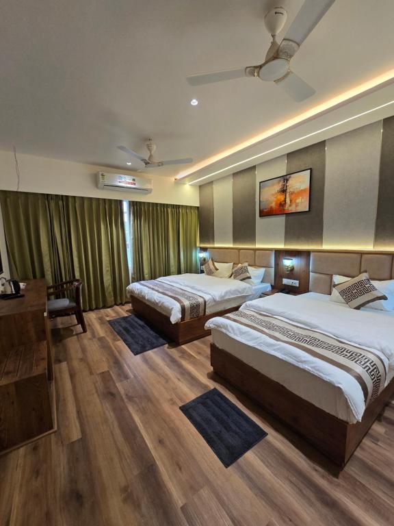 Postel nebo postele na pokoji v ubytování Hotel Fortune