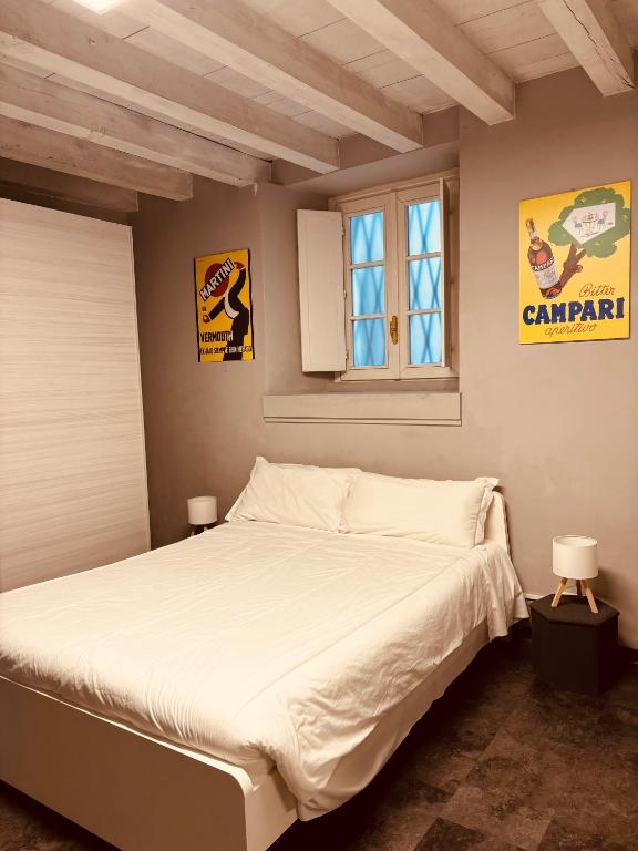 Letto o letti in una camera di Capitolium Ad