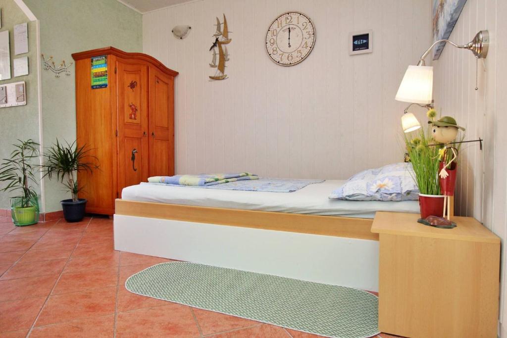 Posteľ alebo postele v izbe v ubytovaní Apartment Renata