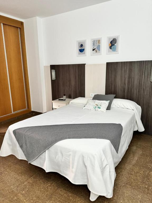 Postel nebo postele na pokoji v ubytování HOTEL MORELL