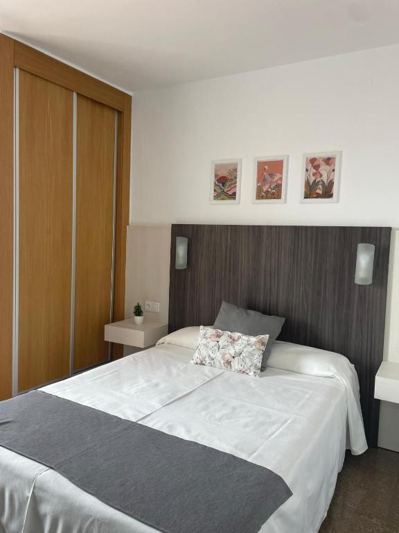 Postel nebo postele na pokoji v ubytování HOTEL MORELL