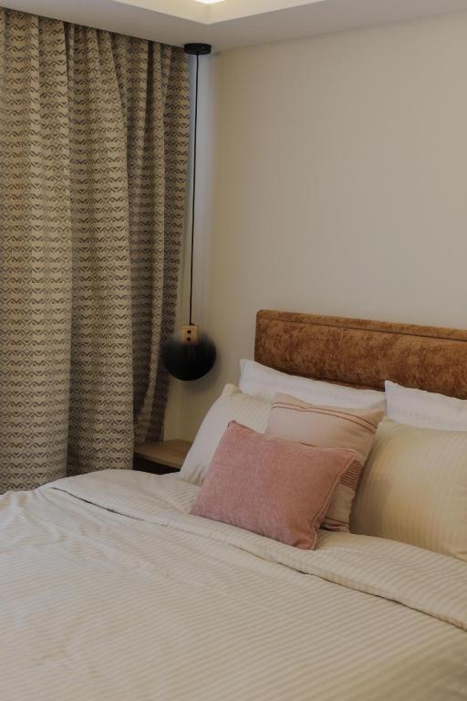 Postel nebo postele na pokoji v ubytování Tarvil Apartmani - Zaovine
