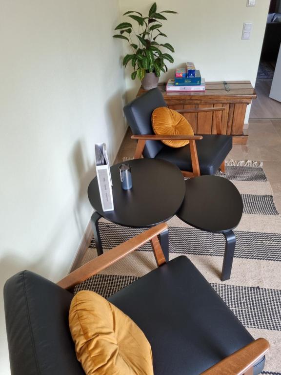 Posezení v ubytování Ferienwohnung mit Garten und Bergblick