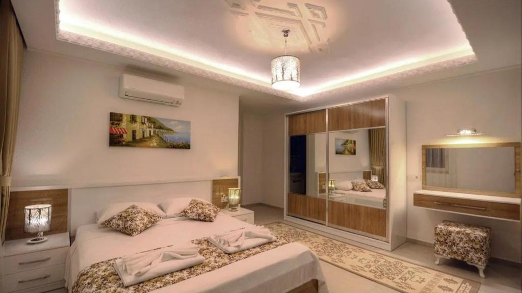 Postel nebo postele na pokoji v ubytování Kalkan 4 Bedroom Villa 2630