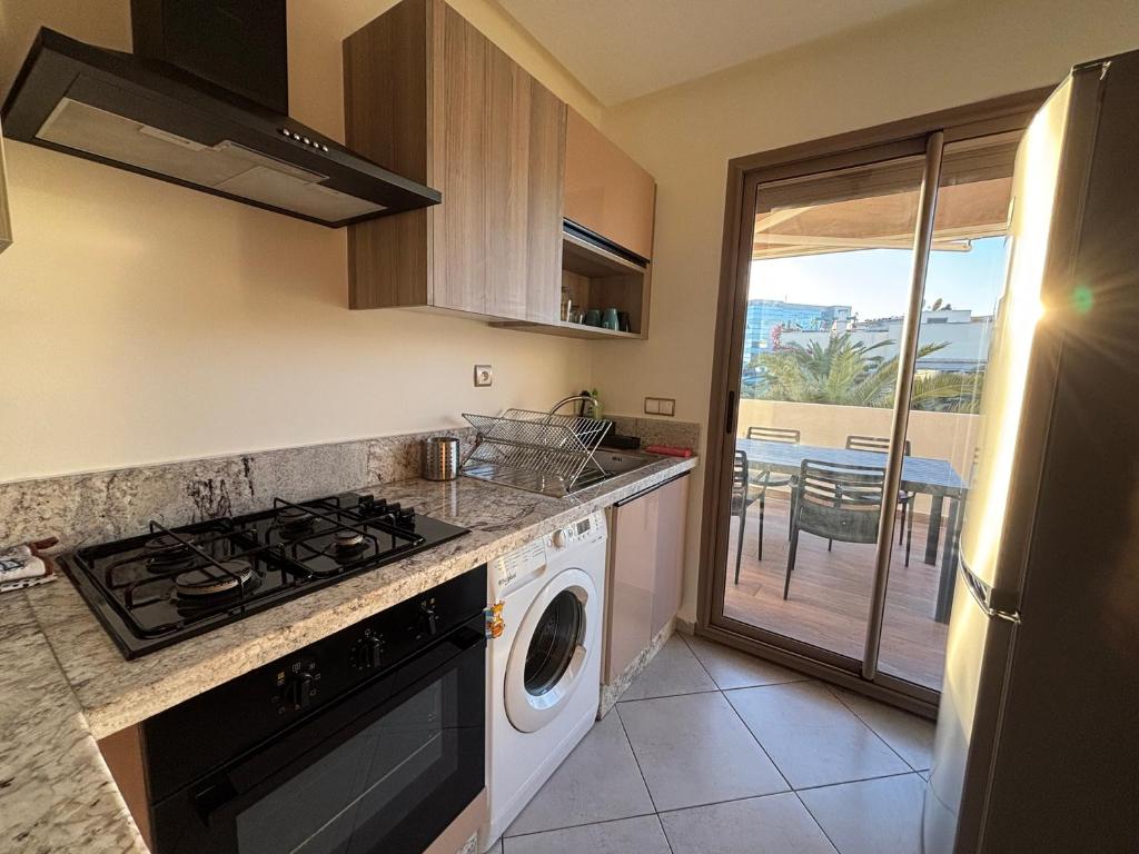 Kuchyň nebo kuchyňský kout v ubytování Appartement de vacances à 5 min de la plage
