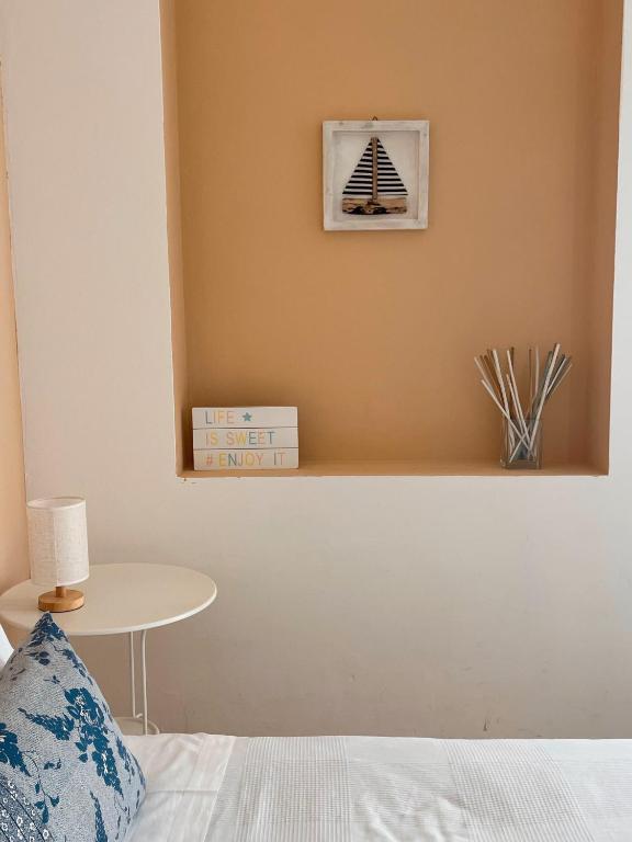 Postel nebo postele na pokoji v ubytování Regina Margherita B&B