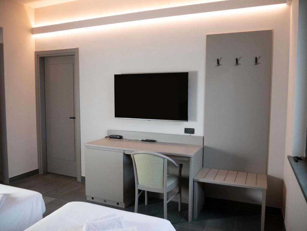 TV a/nebo společenská místnost v ubytování Aldero Hotel