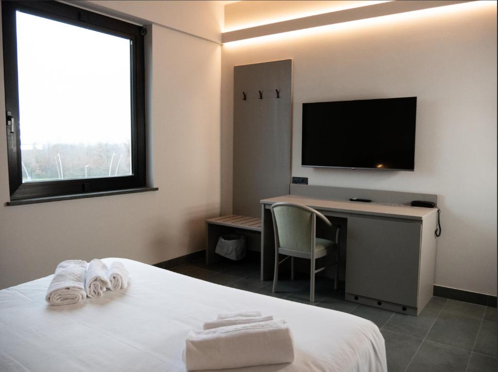 TV a/nebo společenská místnost v ubytování Aldero Hotel