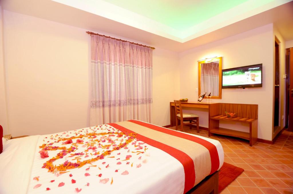 Postel nebo postele na pokoji v ubytování Hotel Utsab Himalaya