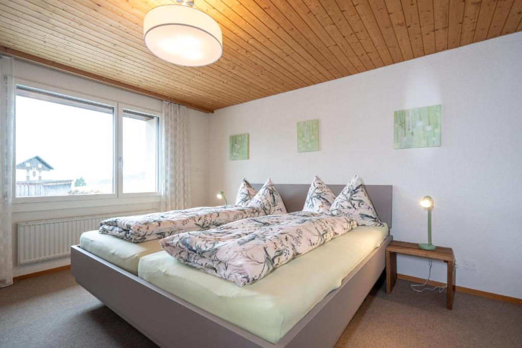 Postel nebo postele na pokoji v ubytování Apartment Bischofberger D22