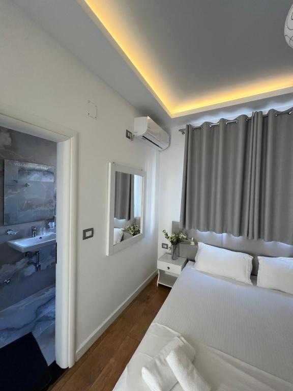 Postel nebo postele na pokoji v ubytování Hotel Myrtai - City Center