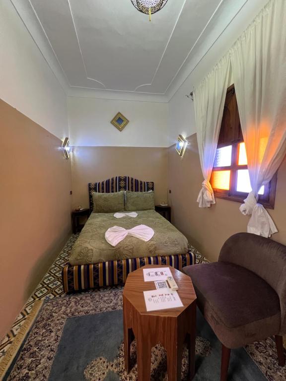 Postel nebo postele na pokoji v ubytování Riad La Perla Bianca