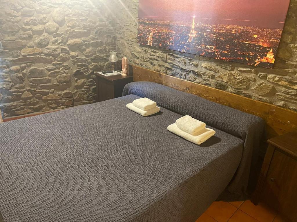 Llit o llits en una habitació de Hostal Rusó SC